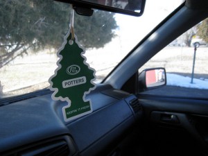 Using an air freshener or odor eliminator can keep your car smelling great. 